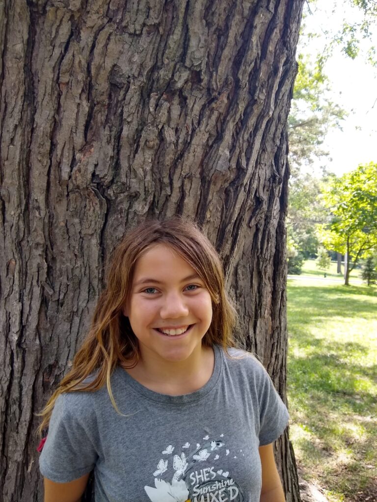 photo of Adi smiling in Riverdale park