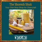Image shows a photo with text on top of it and a border with honeycomb. The text reads The Shoresh Shuk, Your One-Stop Shop for Chanukah, and has the Shoresh logo on the bottom. The photo is of a variety of Shoresh's sustainable Jewish ritual products displayed on a stump with a foresty background. The products are a Havdalah candle, garlic bulbs, a pair of Shabbat candles, a jar of honey, a small tub of beeswax healing salve, a handful of Chanukah candles, and a large pillar candle that has a tree-bark-like texture.