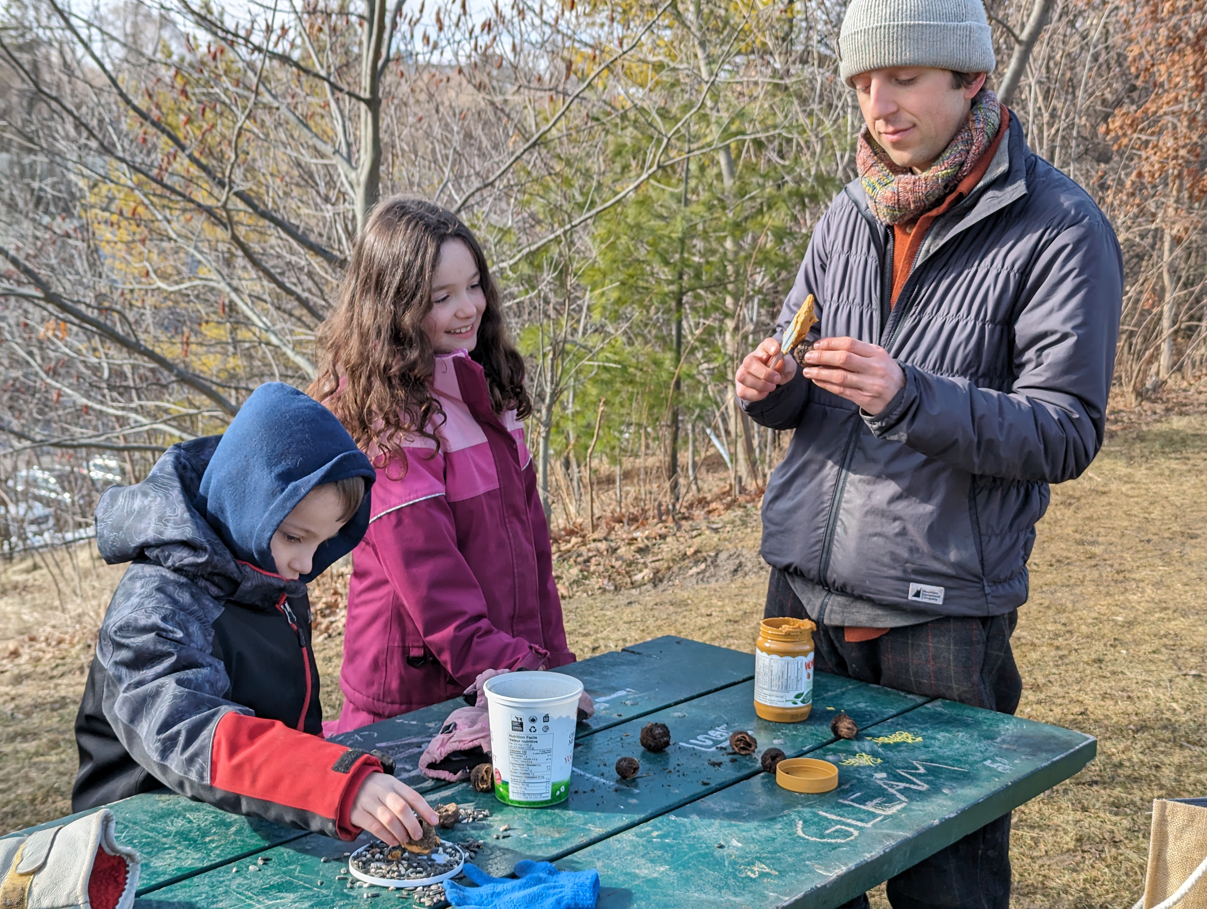 making birdfeeders in outdoor school
