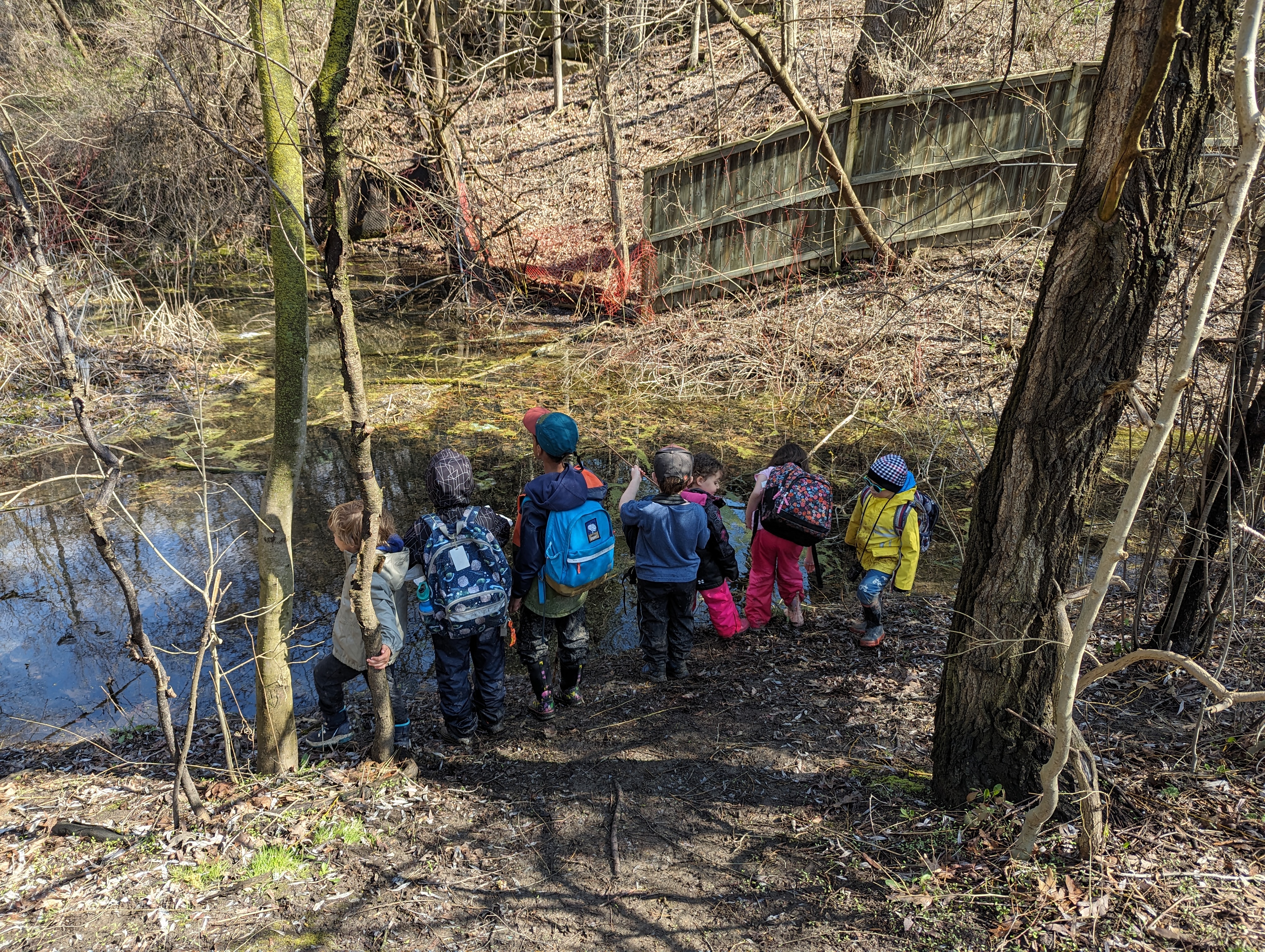 sos kids standing by water