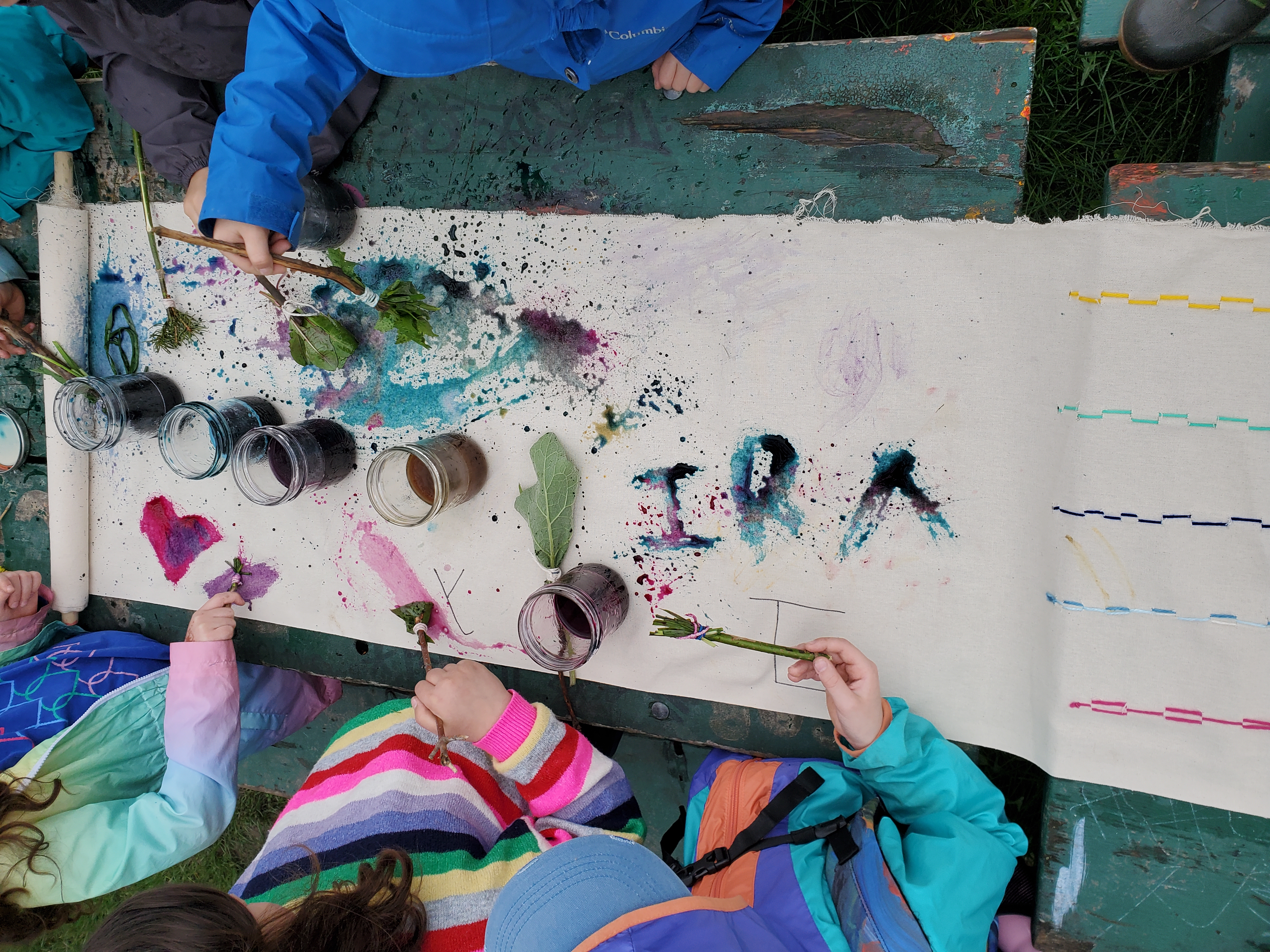 sos cv kids painting on scroll